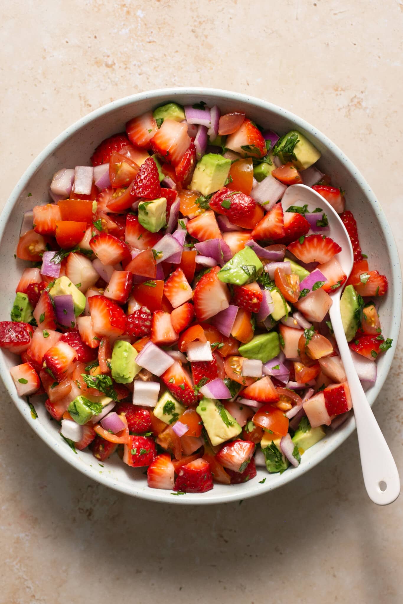 strawberry salsa in a white bowl. 