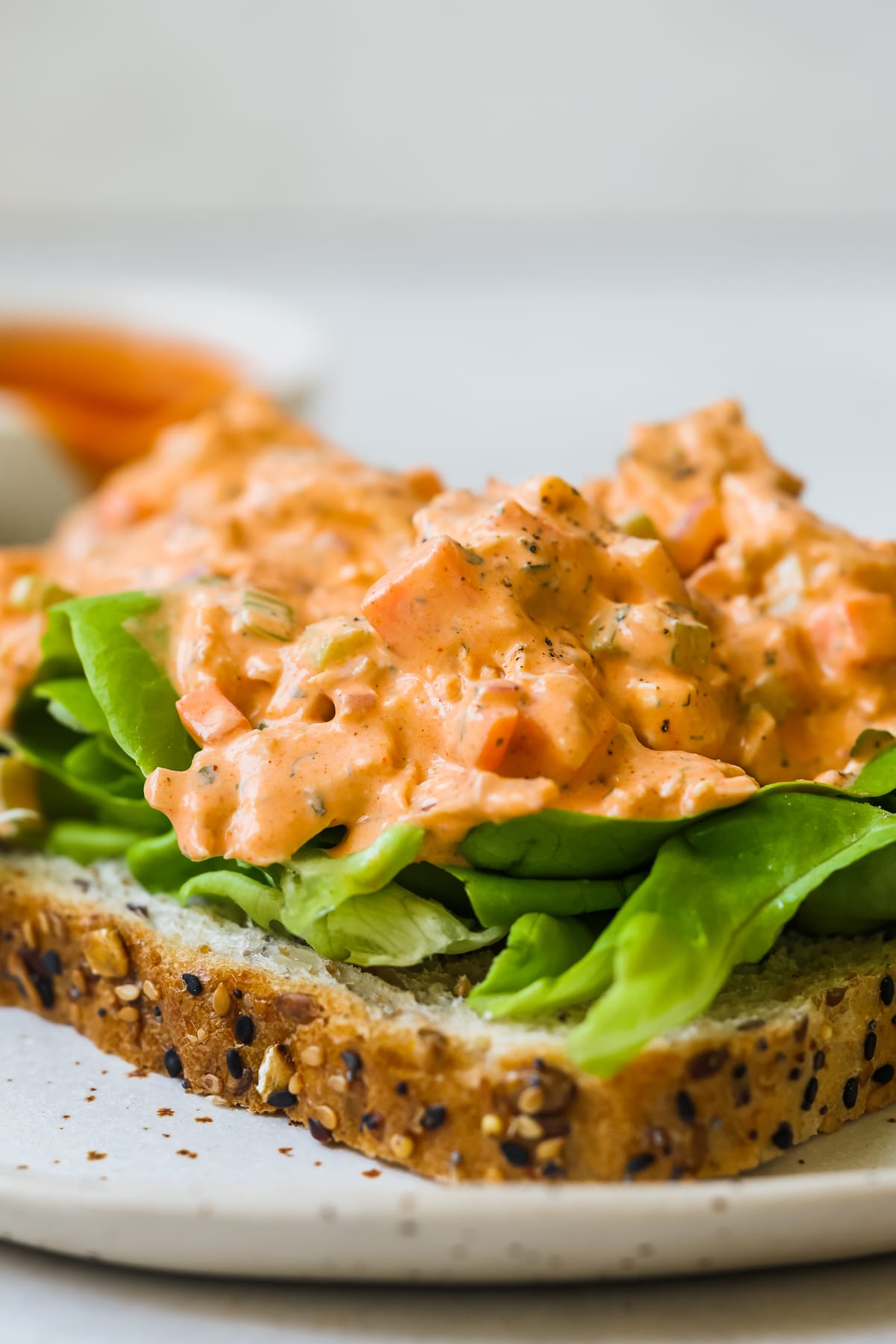 chicken salad on a piece of bread. 