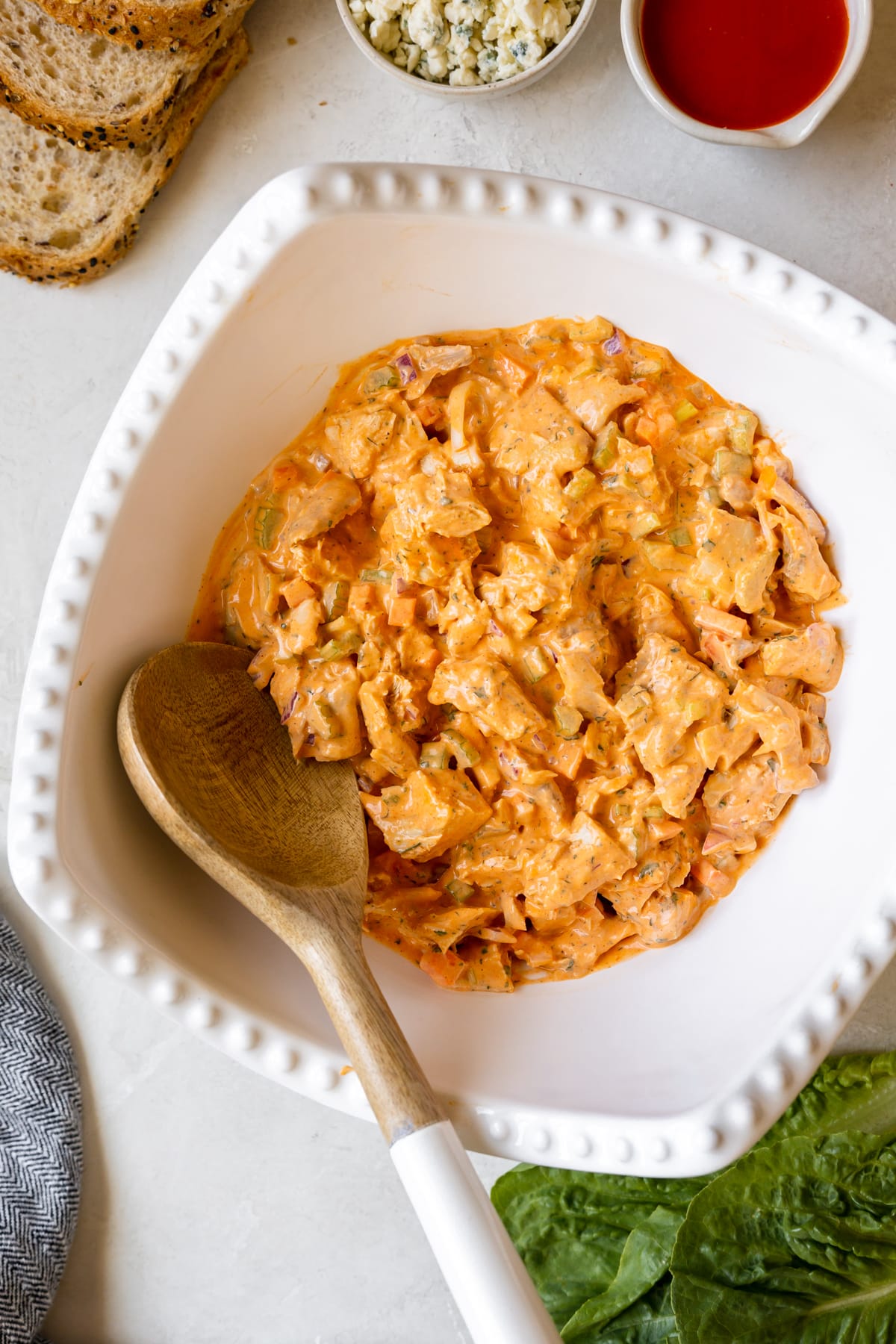 chicken salad in a large white bowl.