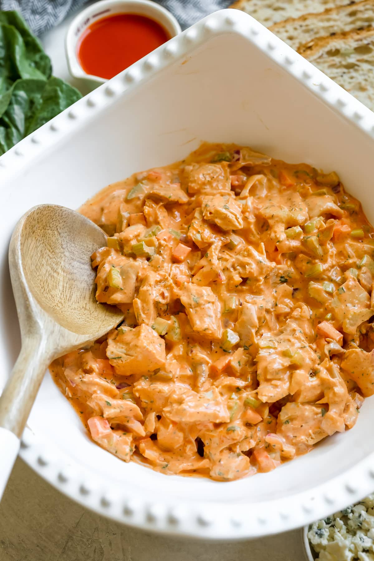 chicken salad in a large white bowl.