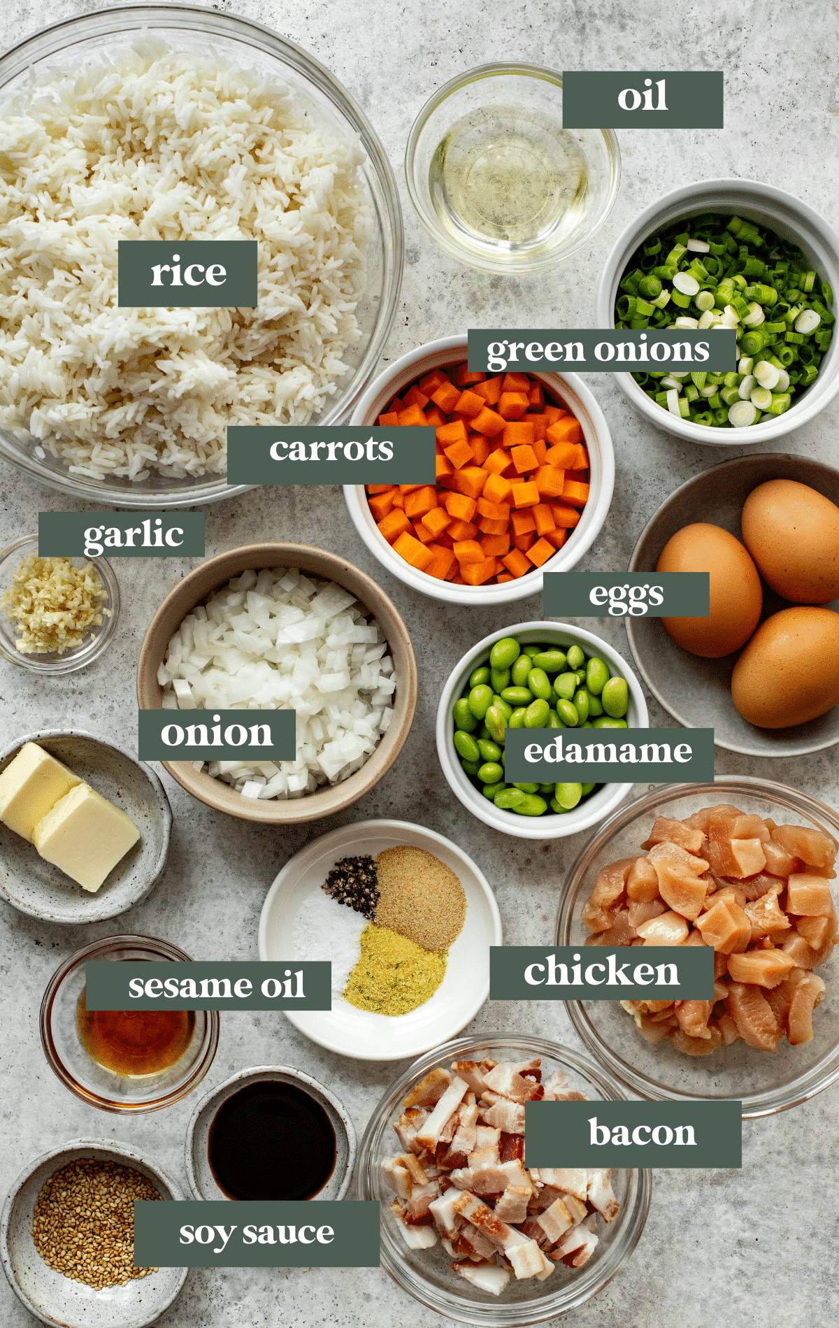 ingredients to make fried rice in small glass bowls. 