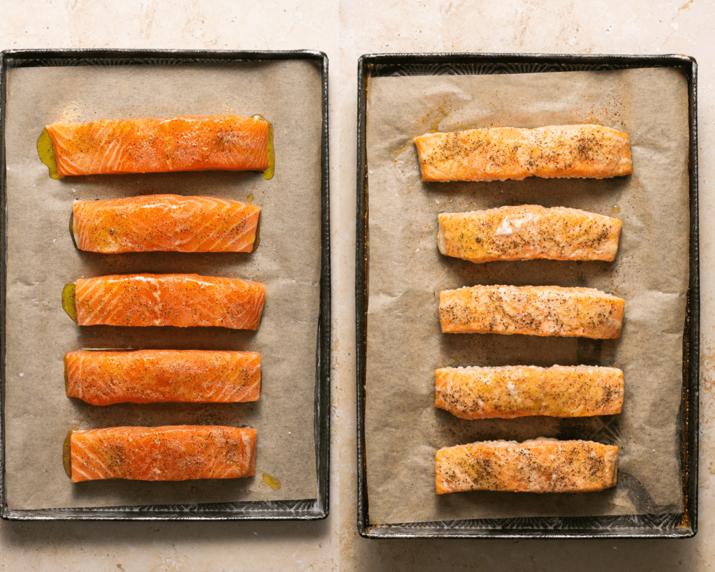 salmon fillets on parchment paper on a baking sheet. 