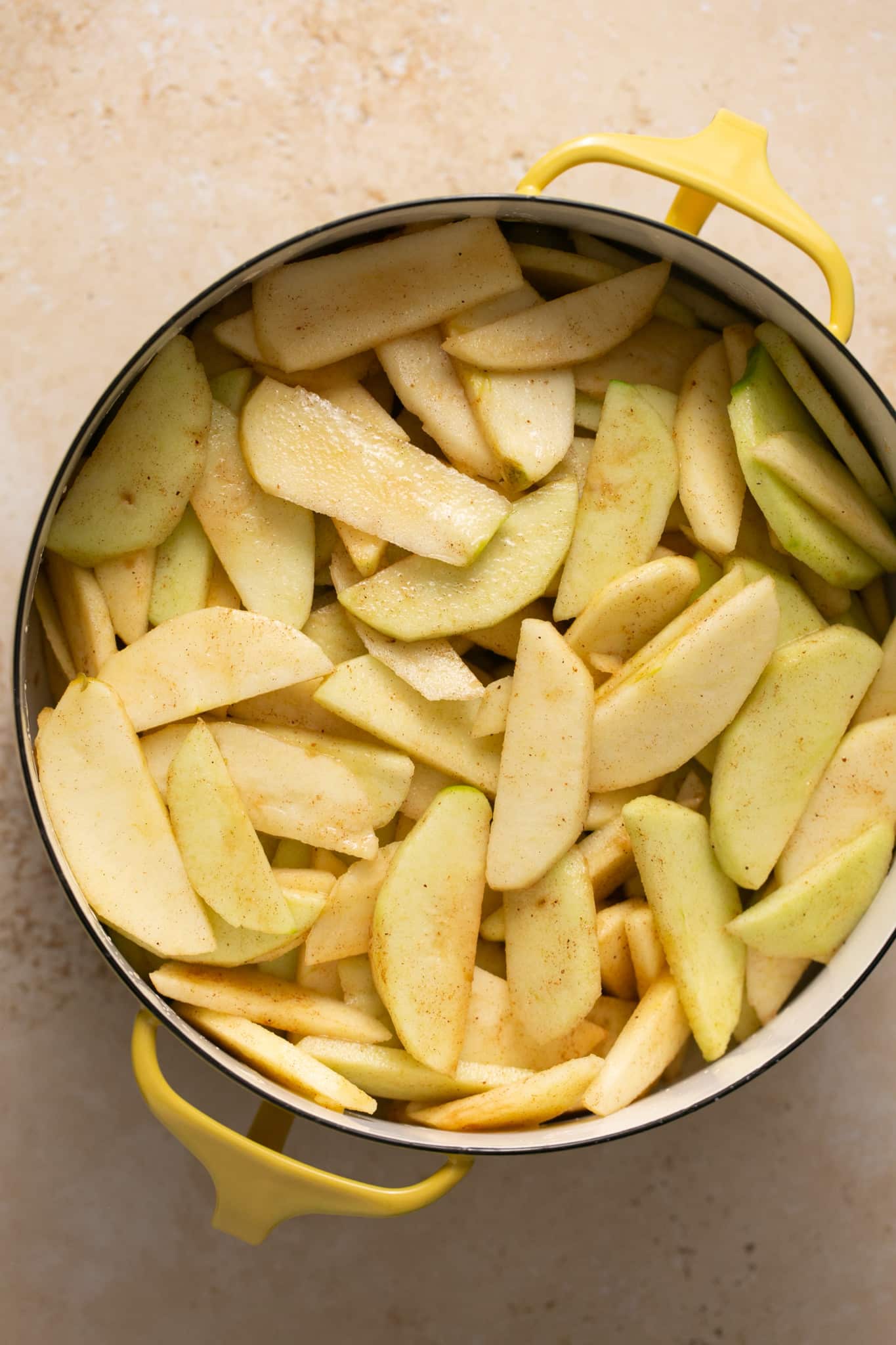 Sliced apples in a pot. 