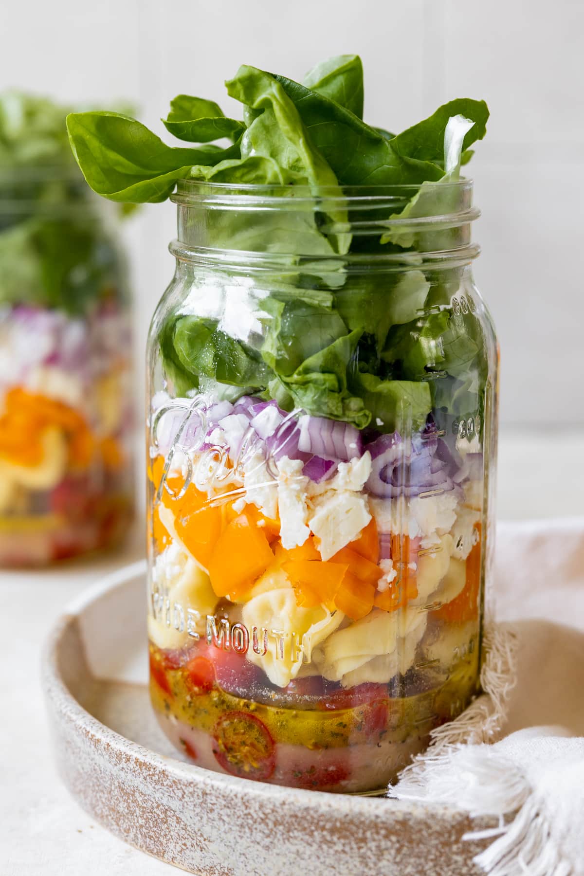 a salad in a glass mason jar. 