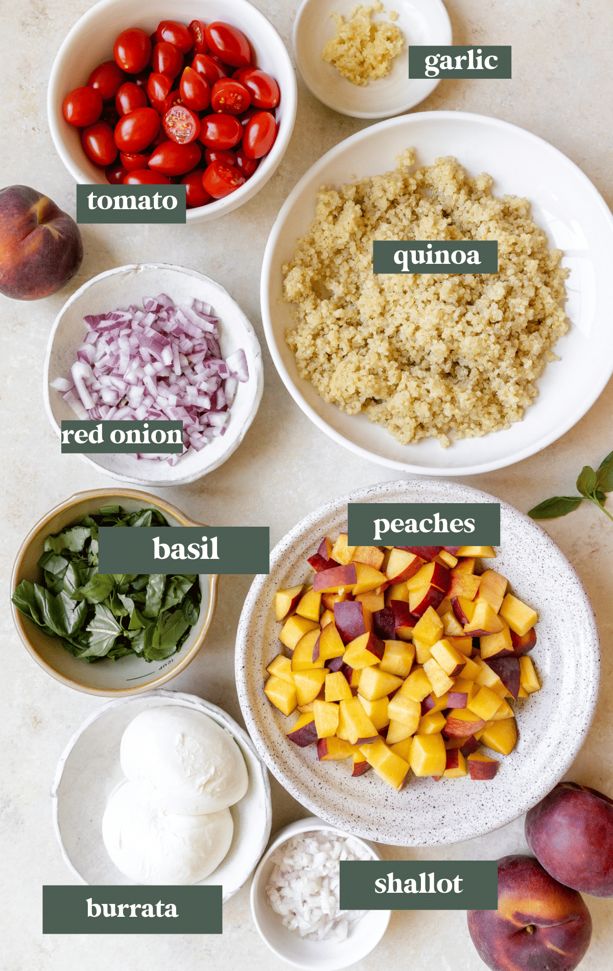 ingredients to make a summer peach salad in small glass bowls. 