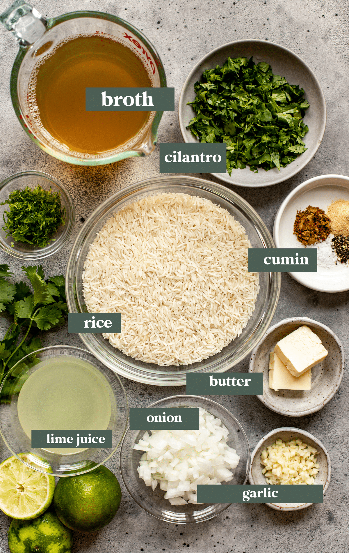 Ingredients needed to make cilantro lime rice in small glass bowls. 