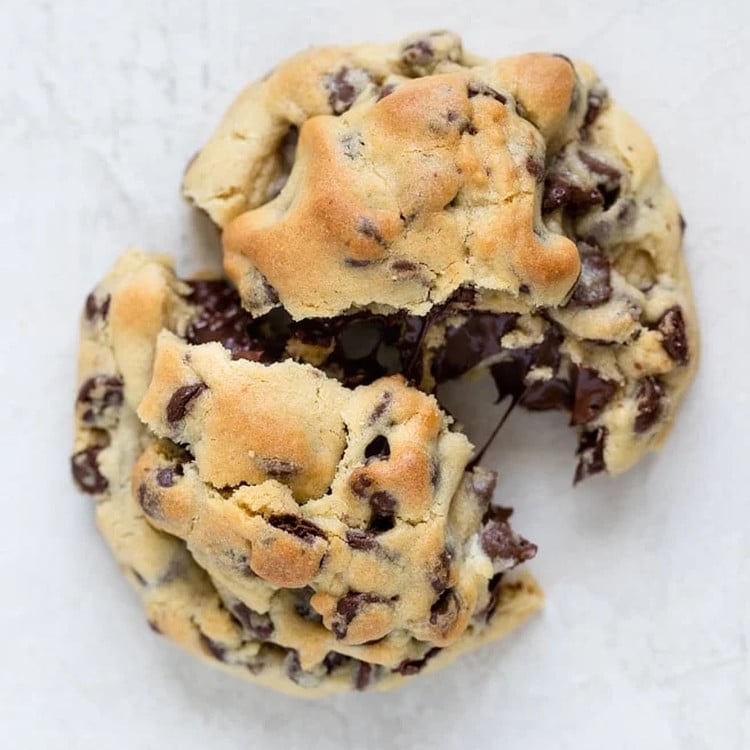 large cookie with chocolate chips split into two halves