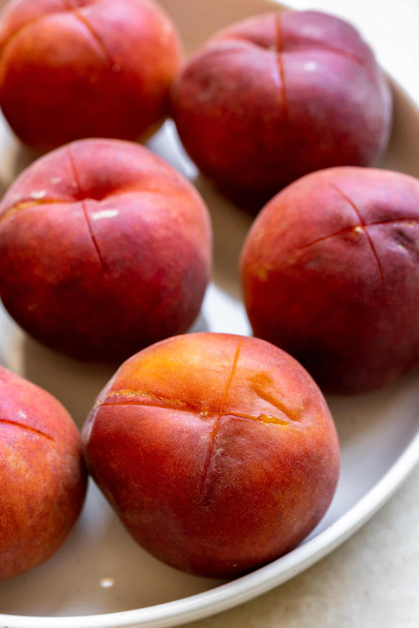 fresh peaches with an X at the bottom. 