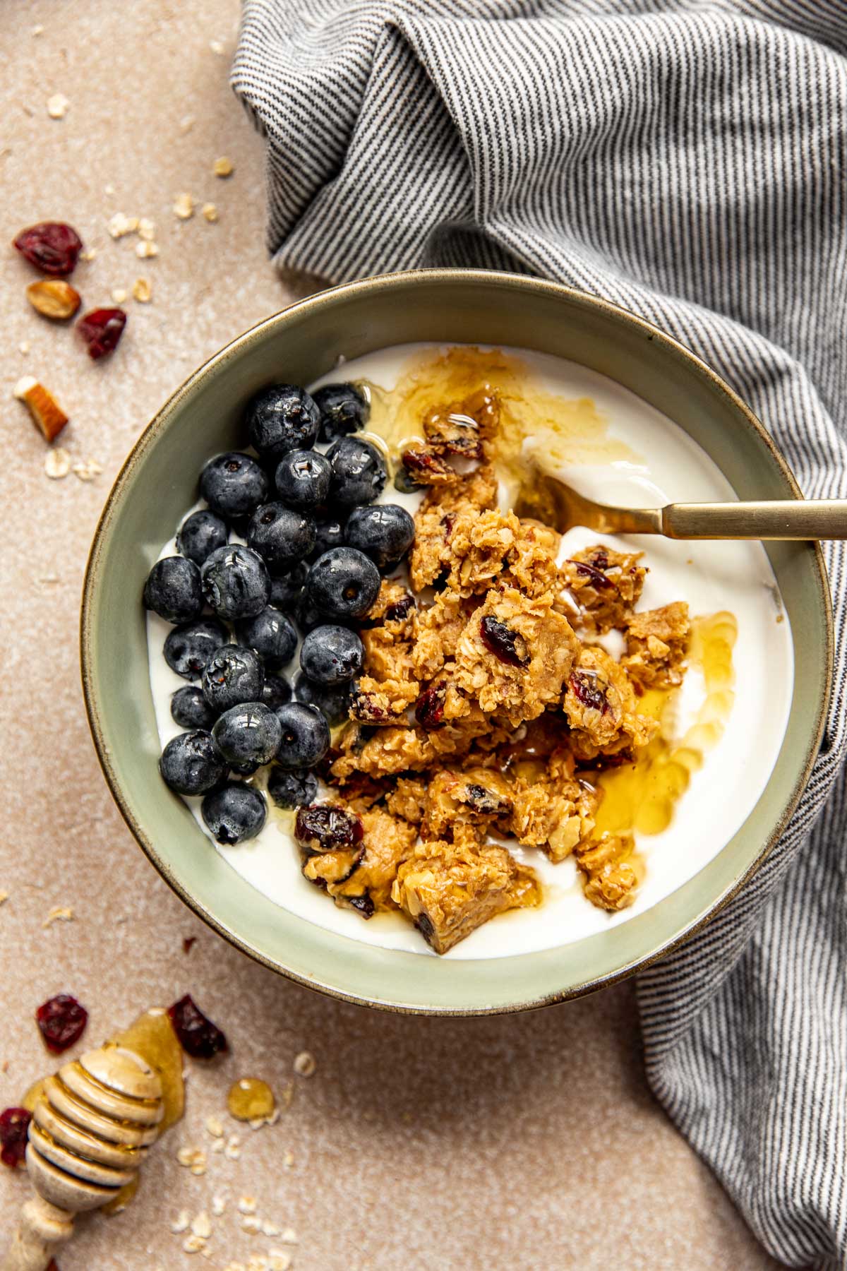 energy bar on yogurt in a bowl with blueberries. 