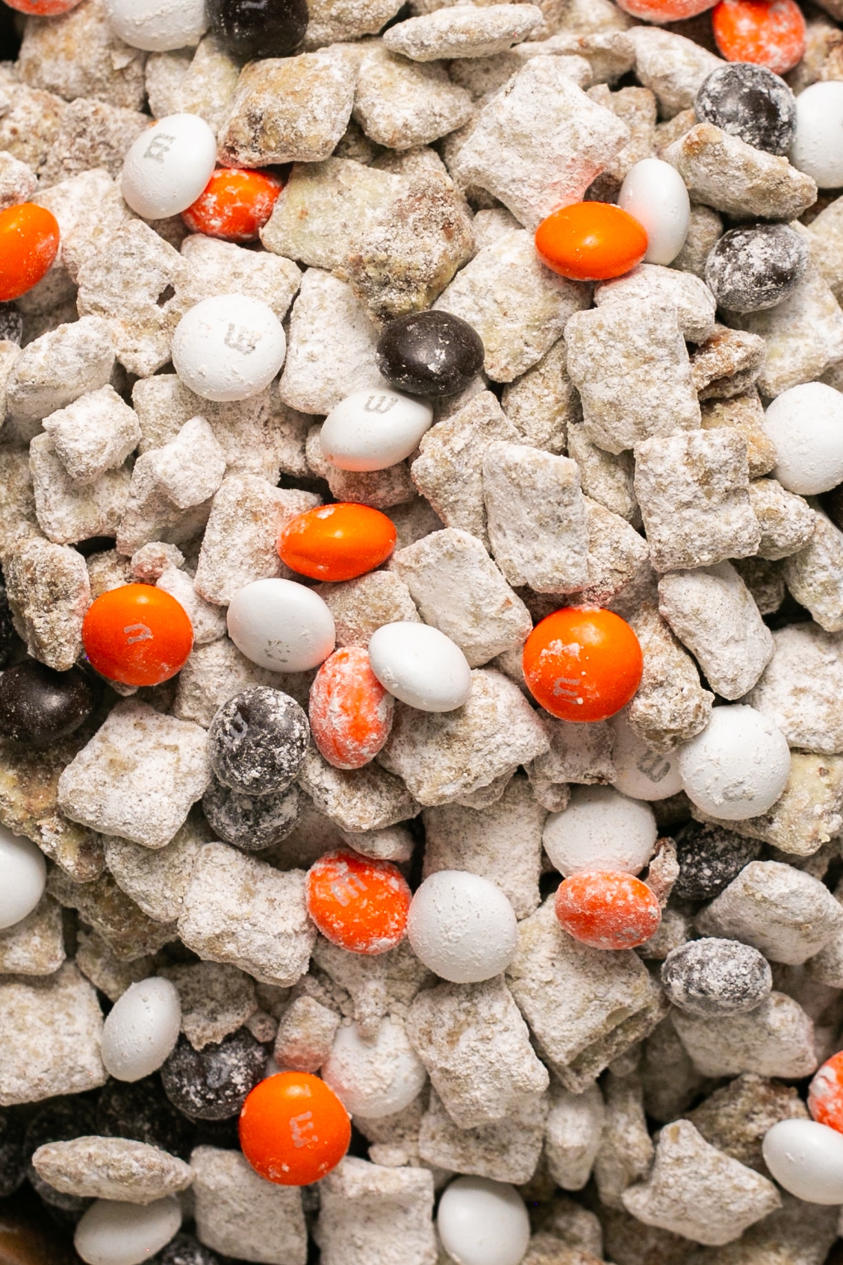 an up close image of puppy chow with M&Ms. 