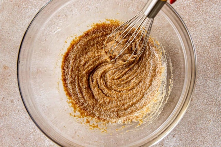 whisk mixing ingredients in cookie batter