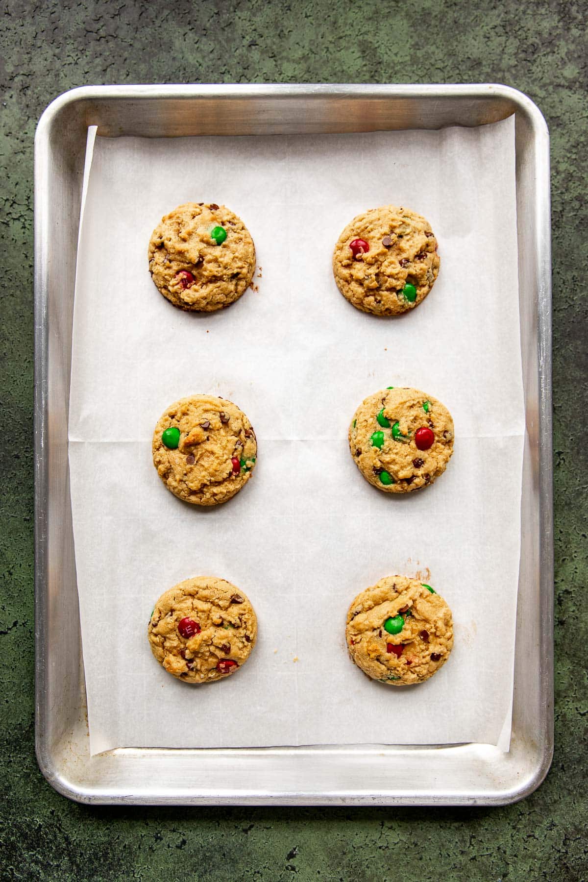 cookies on a cookie sheet lined with parchment paper. 