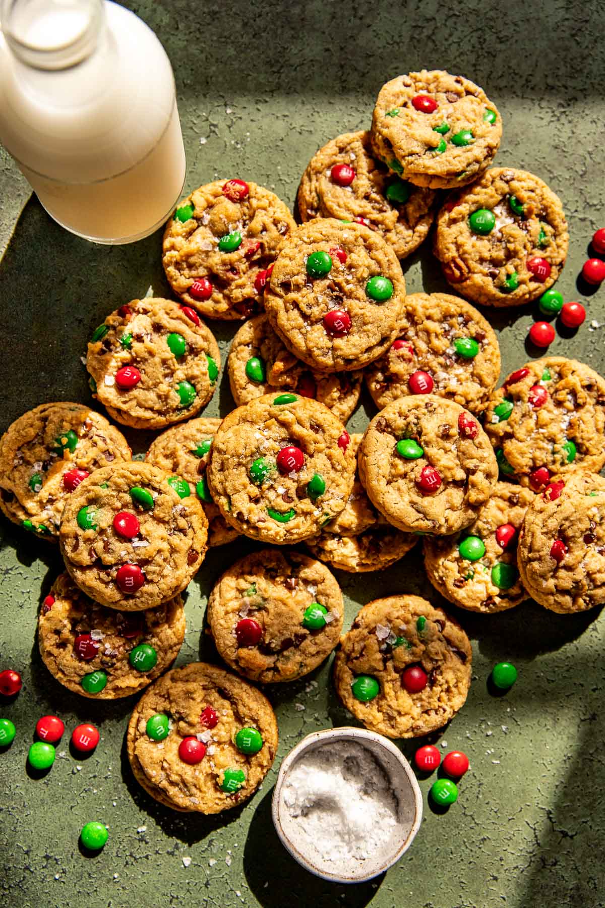 christmas monster cookies garnished with flaky sea salt. 