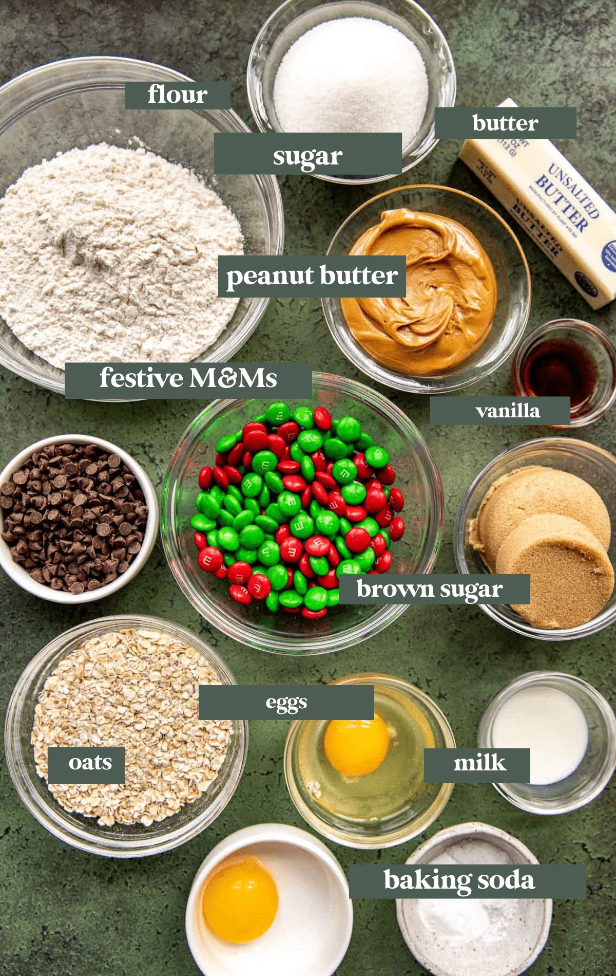 ingredients to make cookies divided into small glass bowls. 