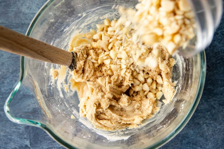 wooden spoon stirring cookie dough