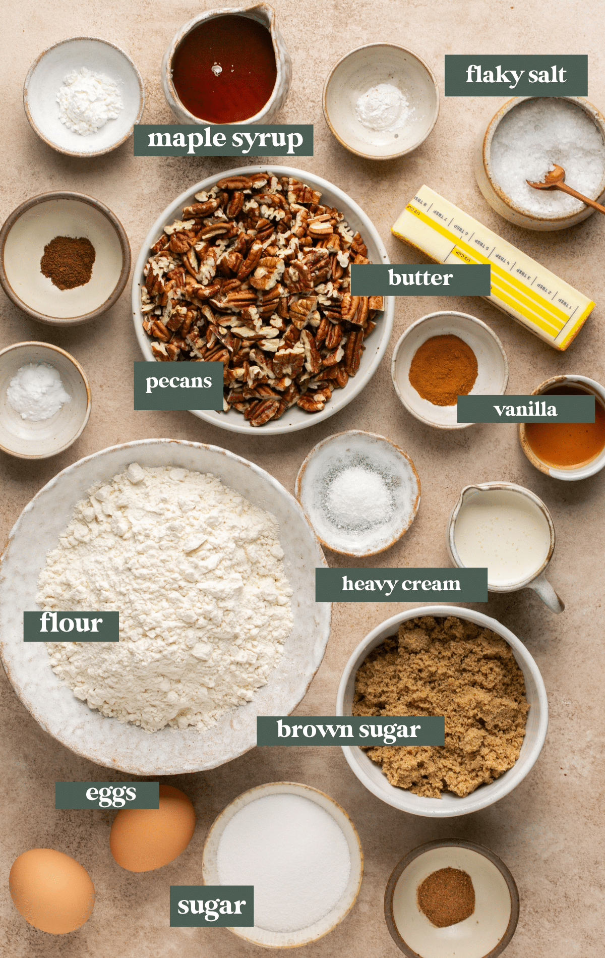 ingredients to make cookies with pecans in small glass dishes.