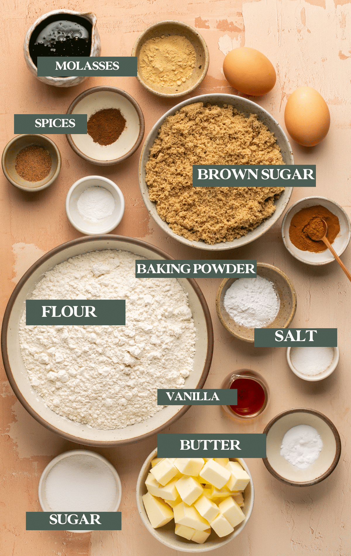 ingredients to make gingerbread snickerdoodle cookies in small glass dishes. 