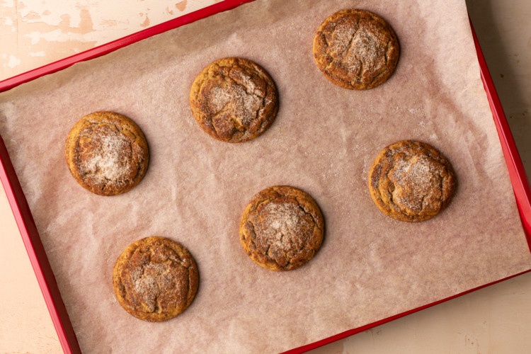 baking sheet with six gingerbread snickerdoodle cookies