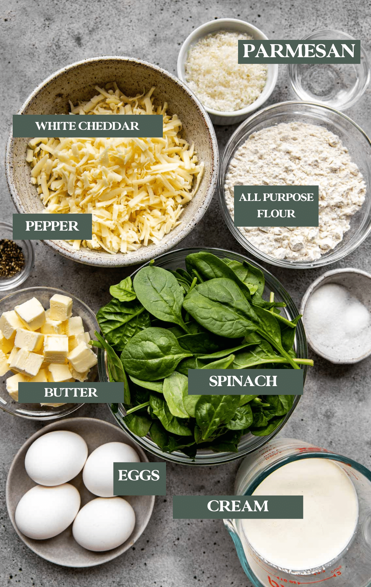 ingredients to make quiche in glass bowls. 