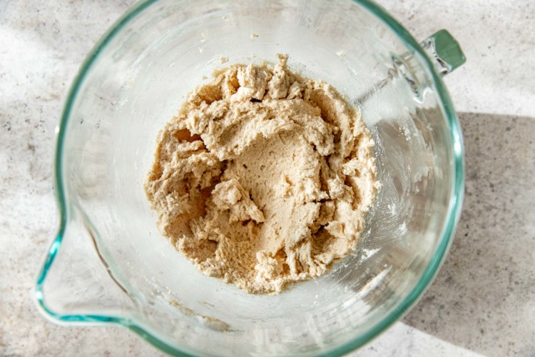 snickerdoodle cookie dough mix in a clear bowl