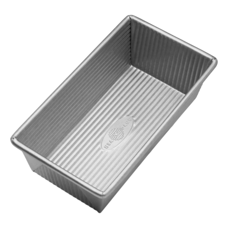 silver bread loaf pan on a white background