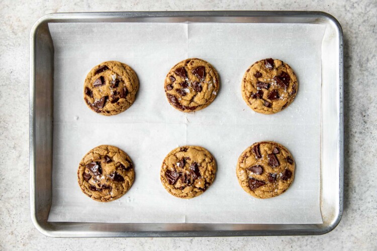 freshly baked cookies on a baking sheet lined with parchment paper.