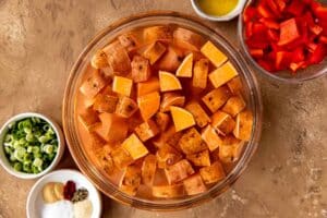sweet potato cubes in a bowl with water.