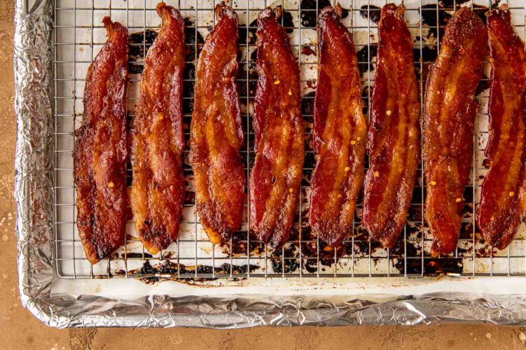 cooked bacon on a sheet pan.
