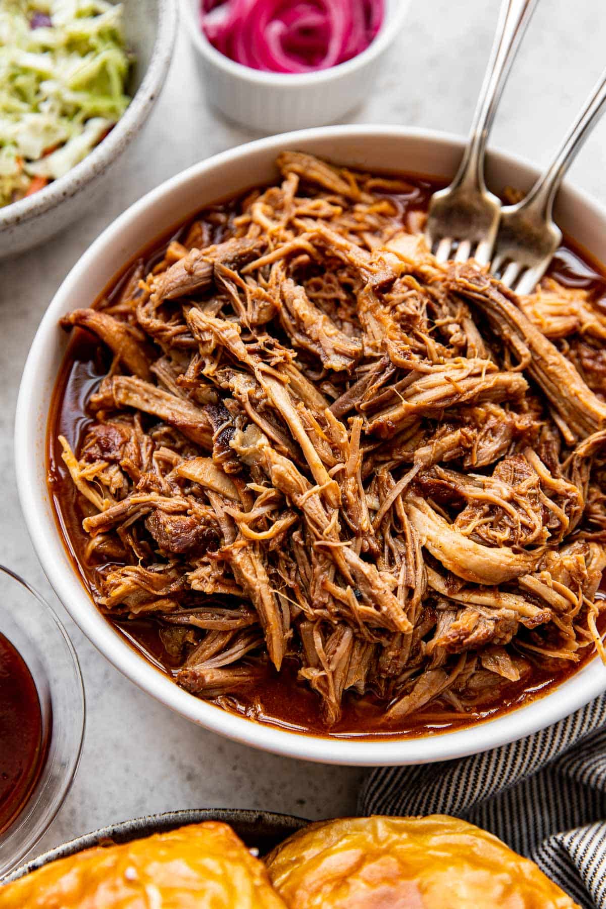 pulled pork in a white bowl. 