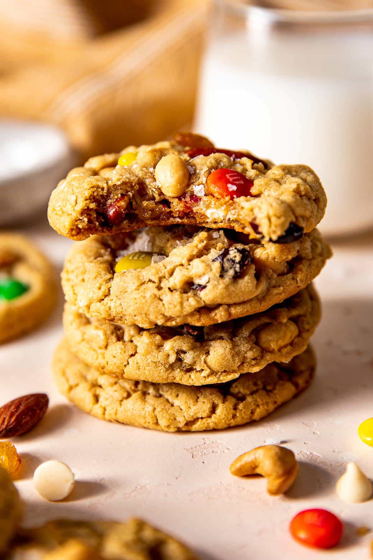 cookies stacked on each other made with trail mix and flaky sea salt on top. 