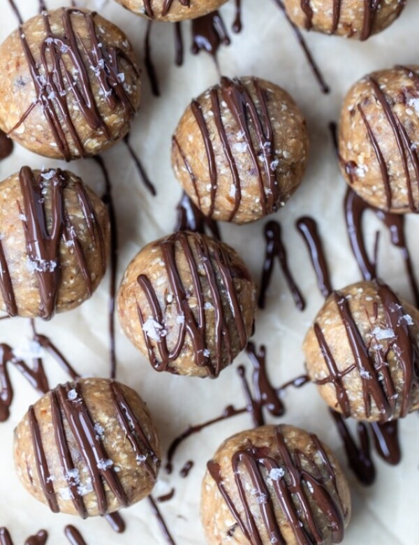 balls of oatmeal drizzled with chocolate sauce and sprinkled with sea salt