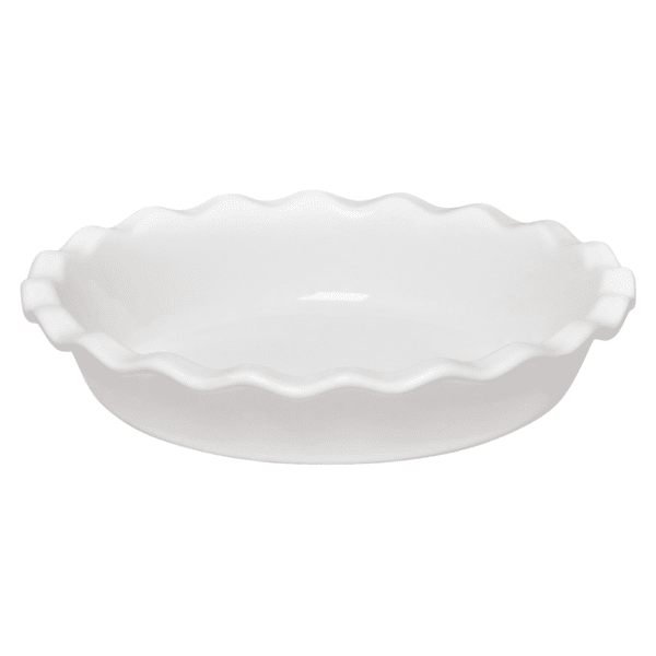 A white ceramic pie pan with scalloped edges.