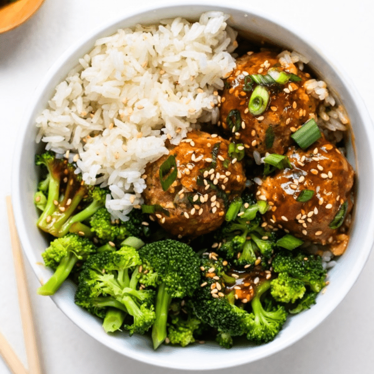 bowl with white rice, meatballs, and broccoli