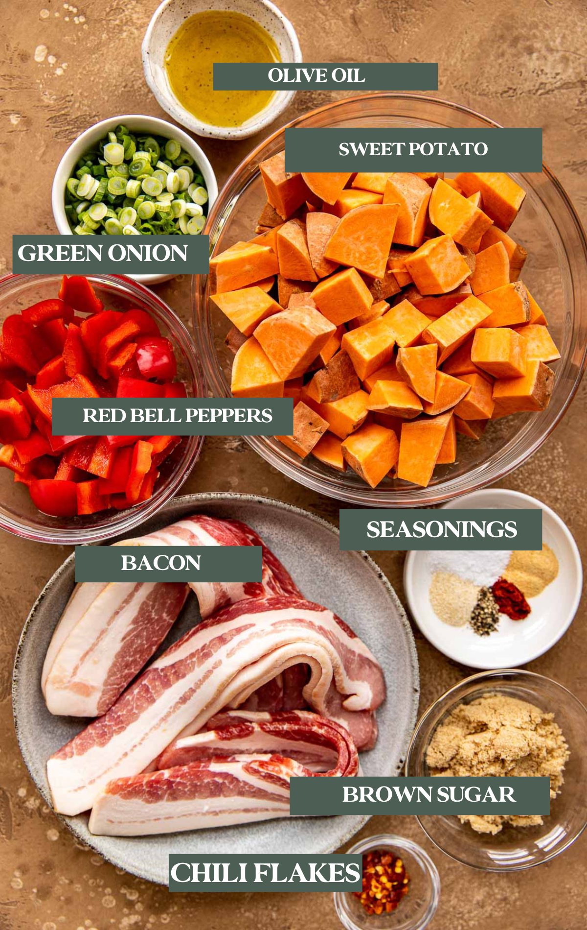 ingredients needed to make roasted sweet potatoes and bacon in small bowls. 
