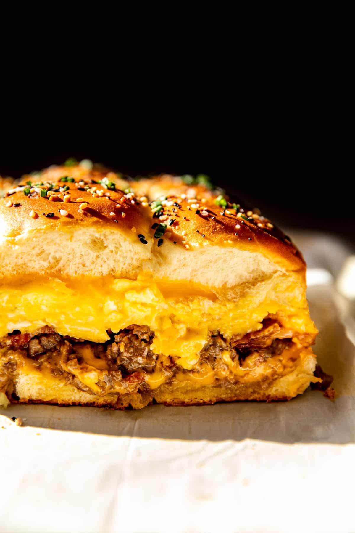 a close up image of breakfast sliders. 