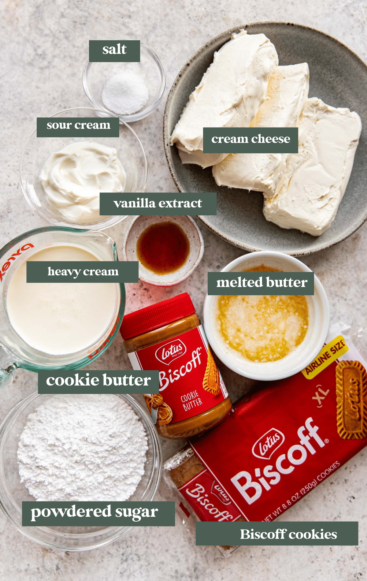 ingredients to make cheesecake in small glass bowls. 