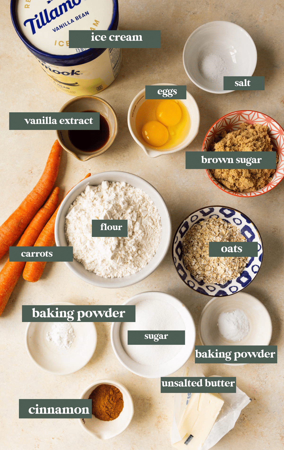 ingredients in small glass bowls to make carrot cake cookies.