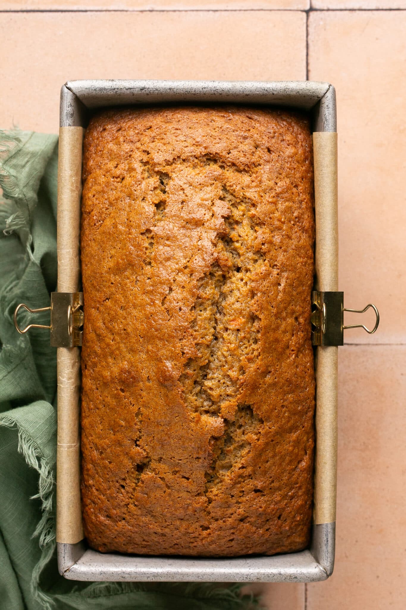 a freshly baked loaf of carrot cake bread. 