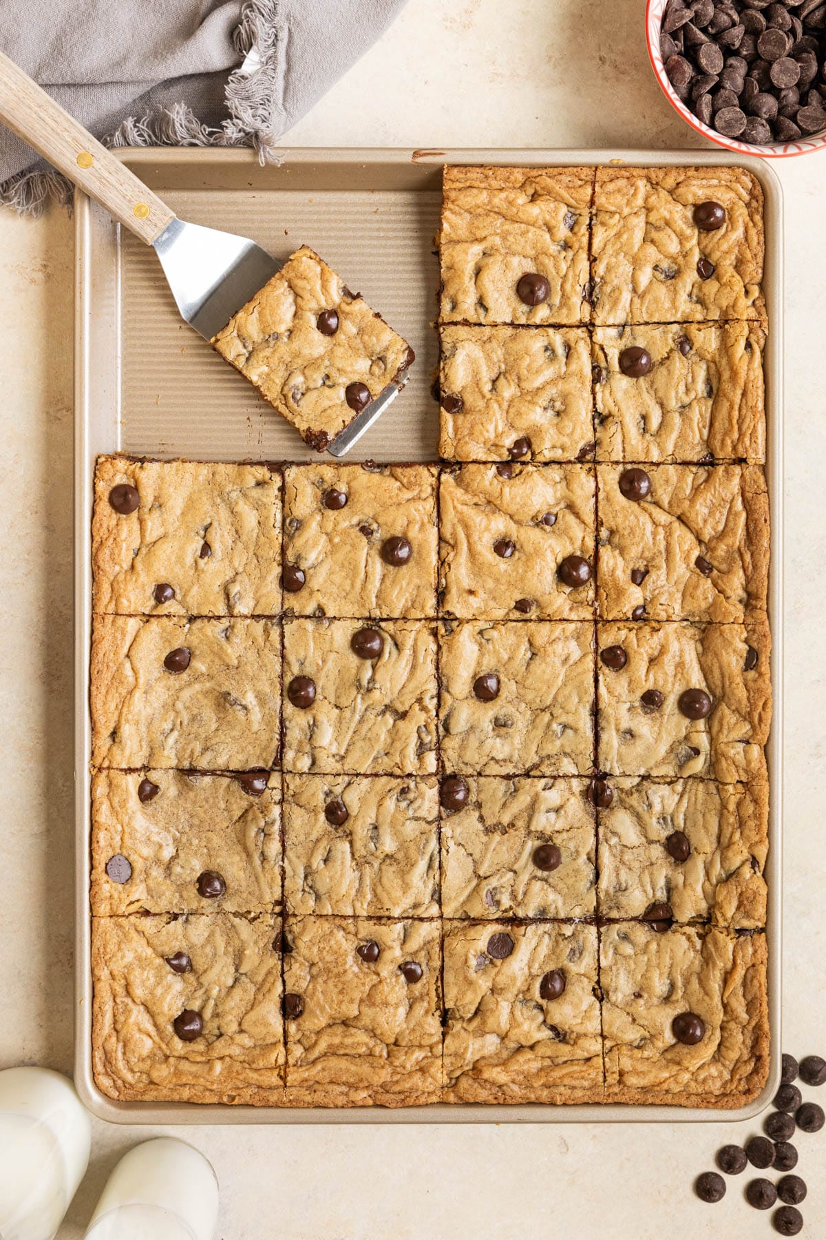 cut up cookie bars on a sheet pan. 
