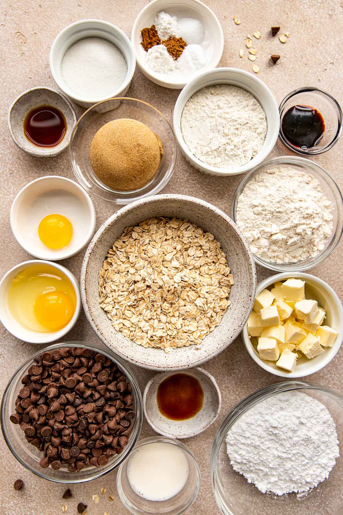ingredients to make cookies in small glass bowls. 