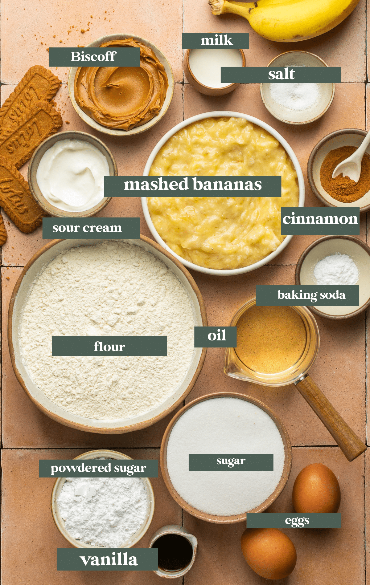 ingredients in small glass bowls needed to make banana bread.
