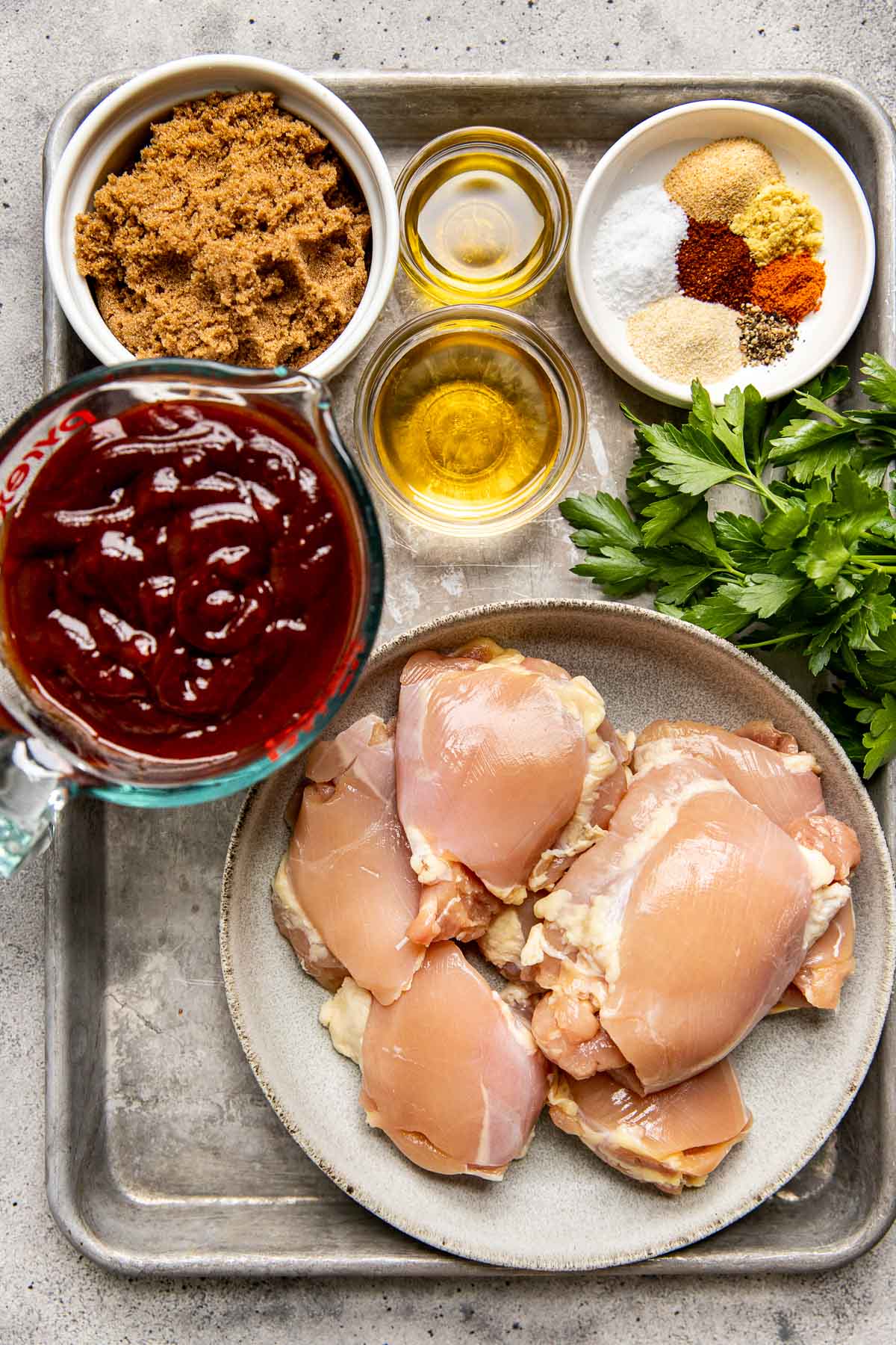 ingredients to make bbq chicken in small bowls. 