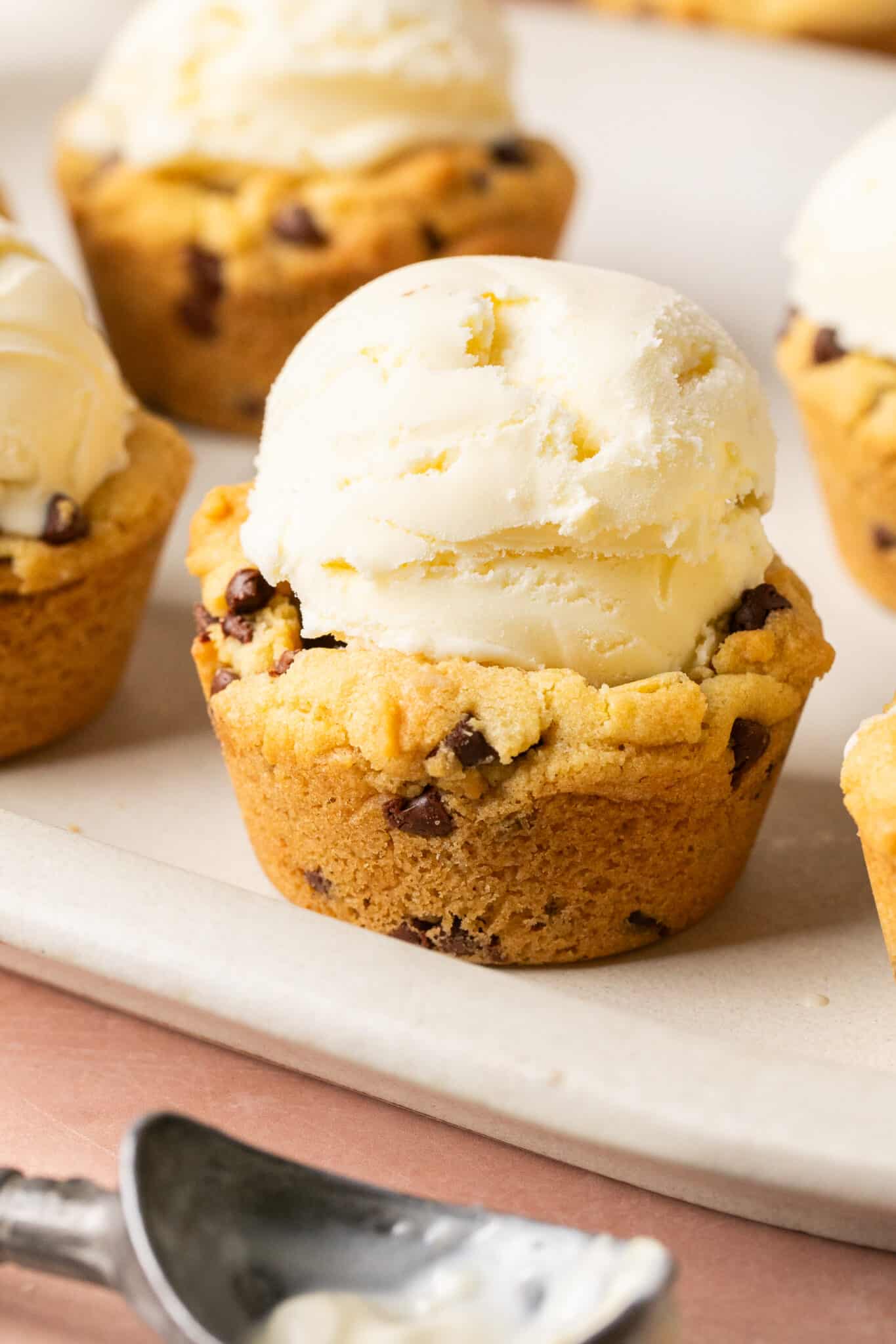 a cookie cup filled with a scoop of ice cream. 