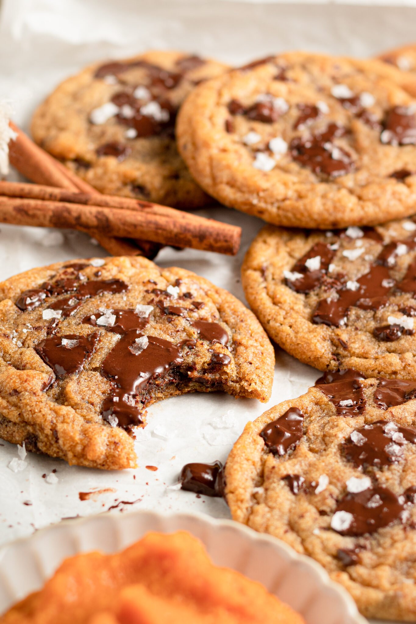 a bite taken from a chocolate chunk cookie.