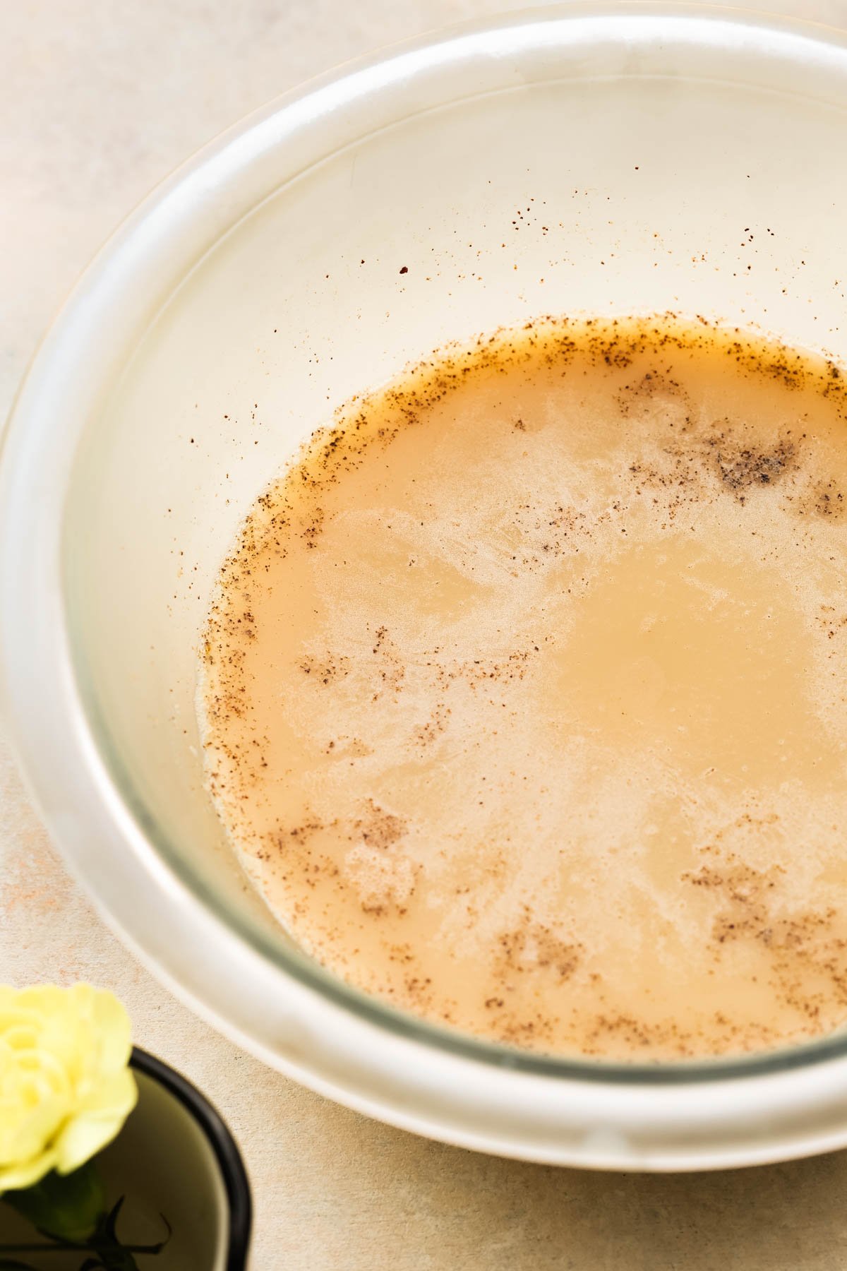 solidified brown butter in a glass bowl.