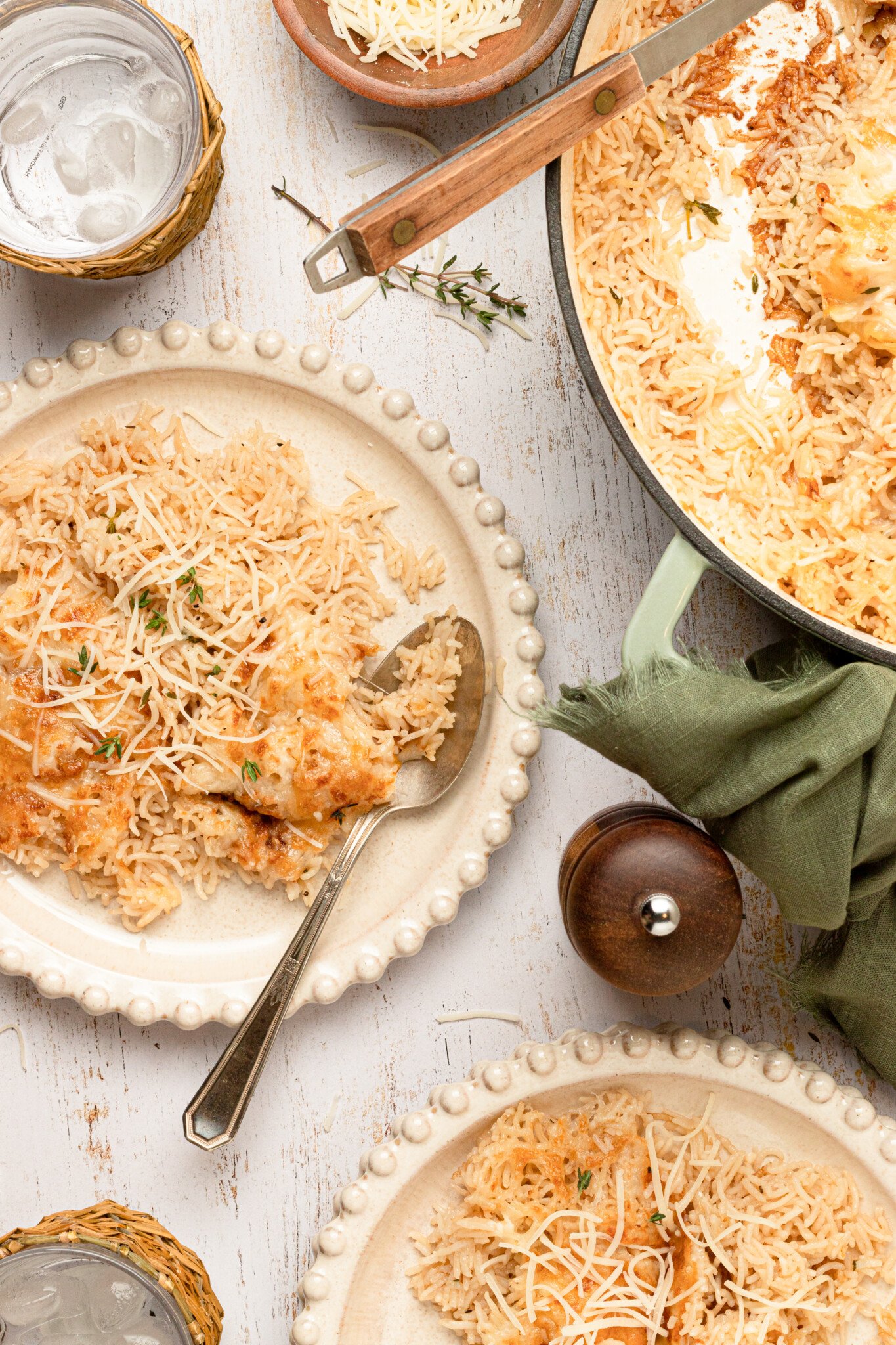 Rice pilaf on plates garnished with thyme. 