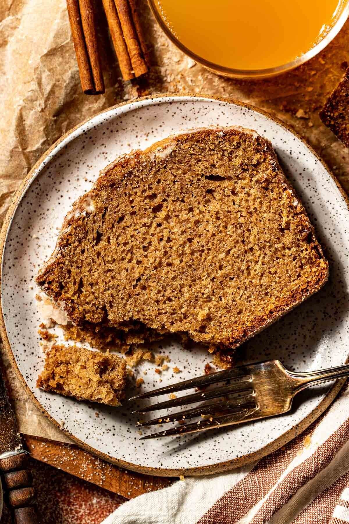 apple cider donut bread slice on plate with fork