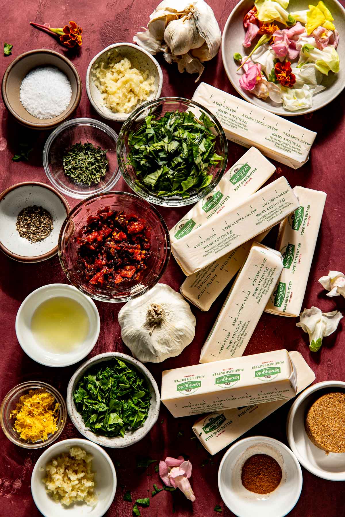 fresh ingredients and butter in small glass bowls. 