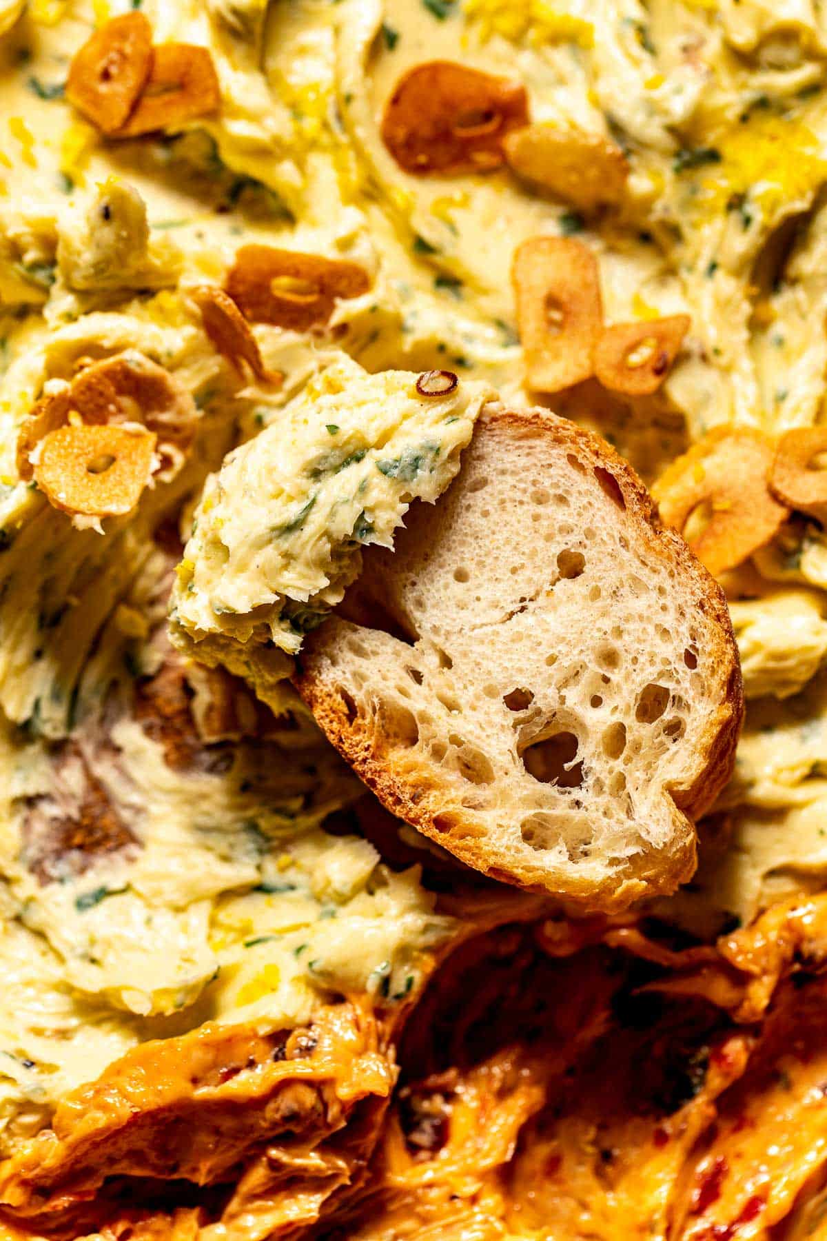 an up close image of butter on bread. 