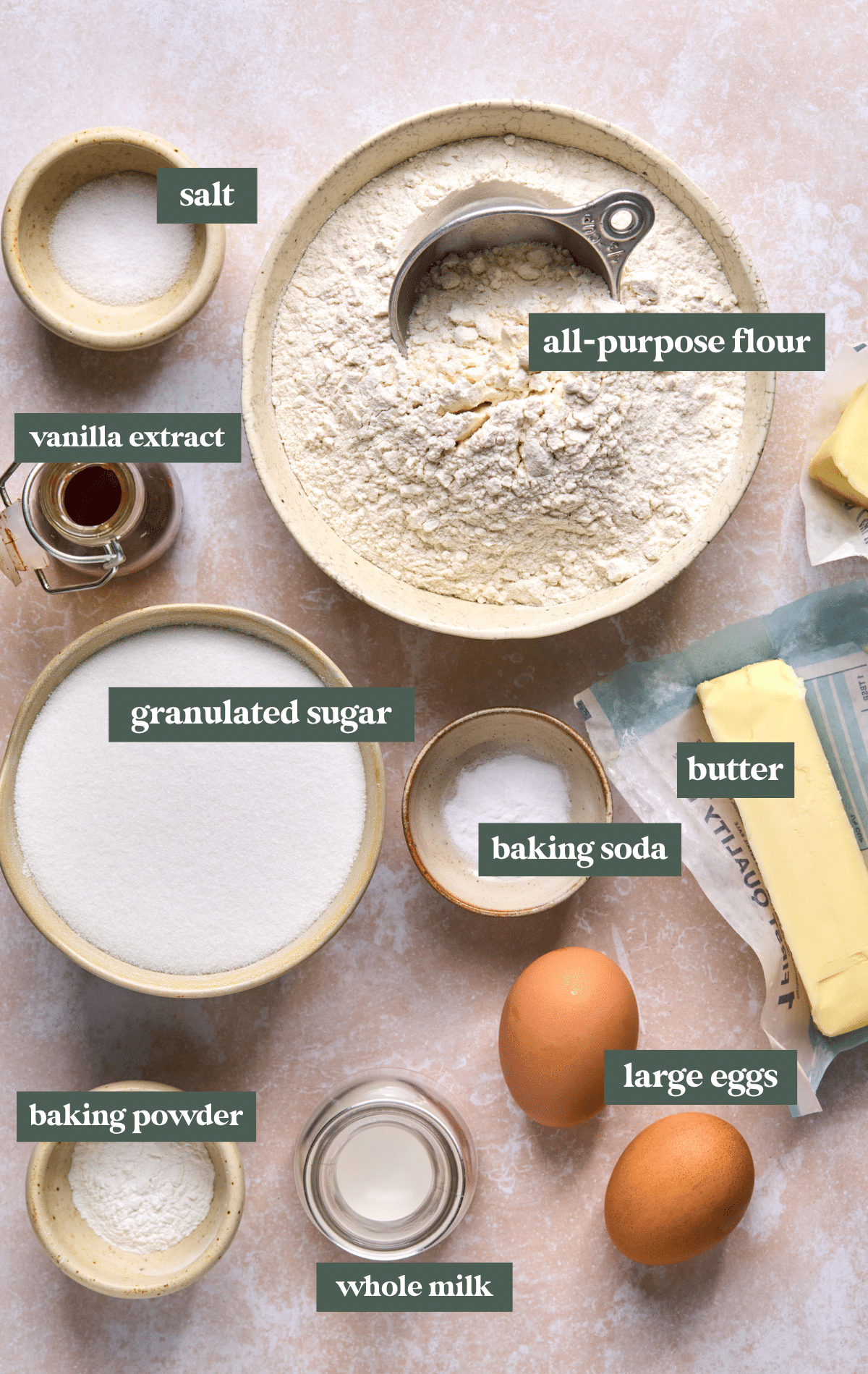 bowls of ingredients needed to make soft and chewy sugar cookies